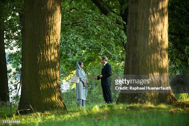 German Foreign Minister Guido Westerwelle talks with Pakistan Foreign Minister Hina Rabbani Khar in the garden of the Villa Borsig in Berlin on...