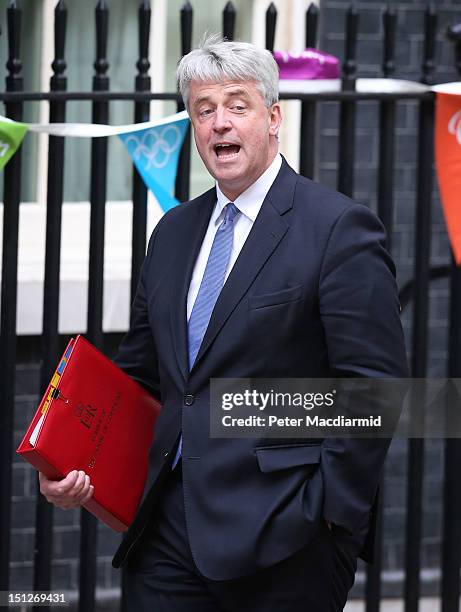 Leader of the Commons Andrew Lansley arrives in Downing Street on September 5, 2012 in London, England. Prime Minister David Cameron is holding his...