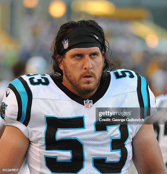 Linebacker Jason Phillips of the Carolina Panthers looks on from the sideline during a preseason game against the Pittsburgh Steelers at Heinz Field...