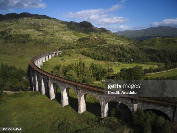 An aerial view of the Glenfinnan Viaduct in Scotland, which became famous tourist attraction center after the Harry Potter movies and where the...