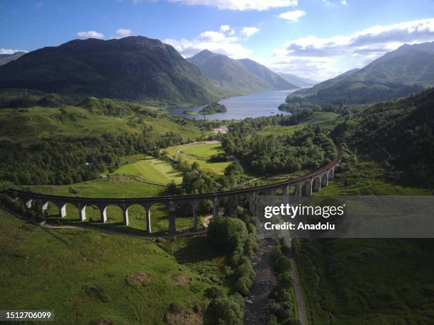 An aerial view of the Glenfinnan Viaduct in Scotland, which became famous tourist attraction center after the Harry Potter movies and where the...