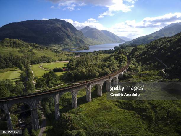 An aerial view of the Glenfinnan Viaduct in Scotland, which became famous tourist attraction center after the Harry Potter movies and where the...