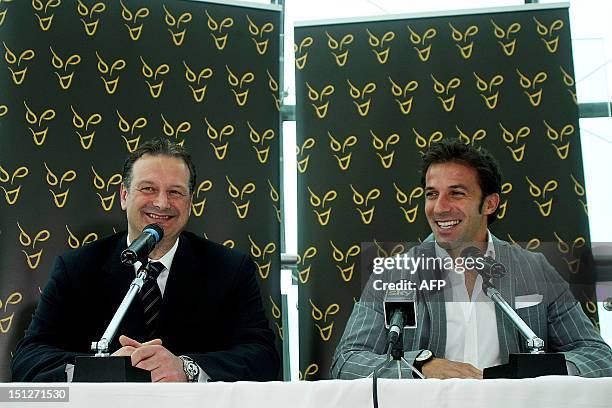 Former Italy and Juventus forward Alessandro Del Piero smiles next to Tony Pignata , CEO of Sydney FC, during a news conference at the Lingotto...