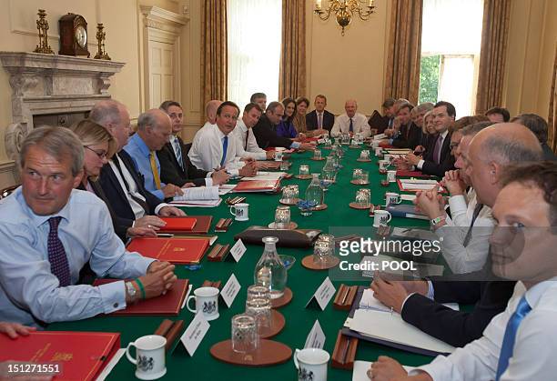 Britain's Prime Minister David Cameron chairs the first cabinet meeting following a government reshuffle at No 10 Downing Street in central London on...