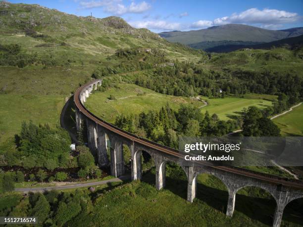 An aerial view of the Glenfinnan Viaduct in Scotland, which became famous tourist attraction center after the Harry Potter movies and where the...