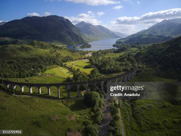 An aerial view of the Glenfinnan Viaduct in Scotland, which became famous tourist attraction center after the Harry Potter movies and where the...