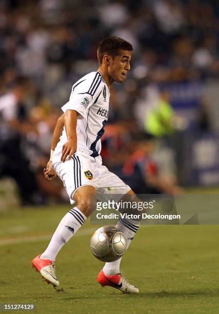 Hector Jimenez of the Los Angeles Galaxy controls the ball during the MLS match against the Vancouver Whitecaps at The Home Depot Center on September...