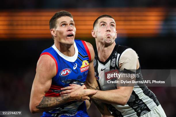 Rory Lobb of the Bulldogs and Darcy Cameron of the Magpies compete in a ruck contest during the 2023 AFL Round 17 match between the Western Bulldogs...