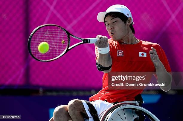 Shingo Kunieda of Japan plays a forehand in the Quad Doubles Wheelchair Tennis Bronze Medal match on day 7 of the London 2012 Paralympic Games at...