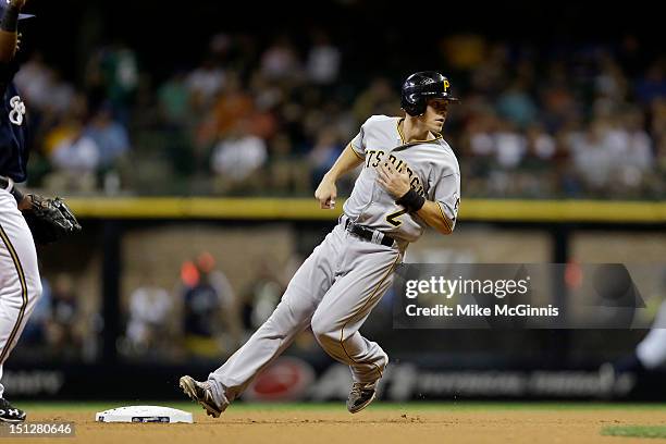 Brock Holt of the Pittsburgh Pirates runs to second base during the game against the Milwaukee Brewers at Miller Park on September 01, 2012 in...