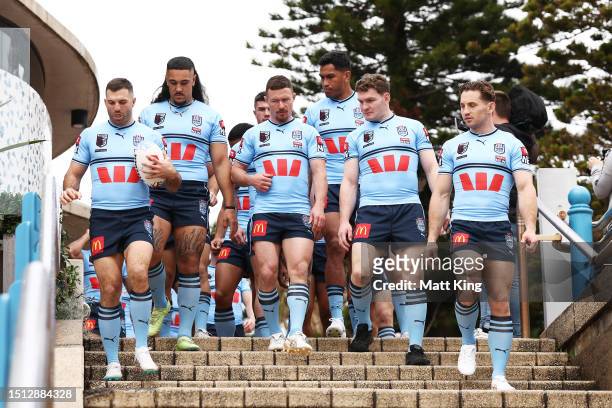 Blues players arrive for a team photo during a New South Wales Blues State of Origin Media Opportunity at Coogee Surf Life Saving Club on July 04,...