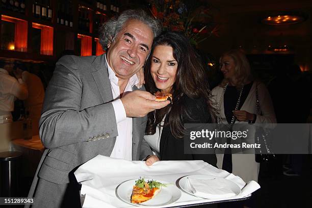 Owner Adnan Oral and Mariella von Faber-Castell attend the re-opening party of Adnan Restaurant on September 5, 2012 in Berlin, Germany.