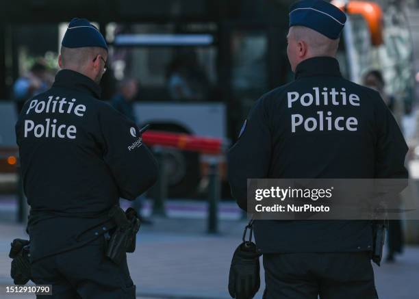 Members of the Brussels Police are seen next to the entrance to the European Parliament, in Brussels, Belgium, on May 31, 2023.