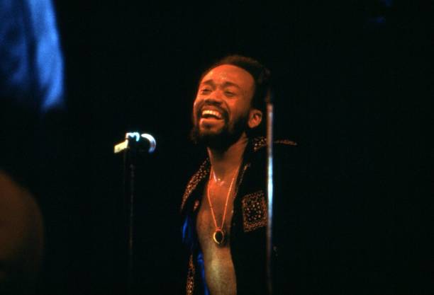 Singer and songwriter Maurice White of the soul and funk band Earth, Wind, and Fire performs in July, 1972 at a record company showcase in London,...