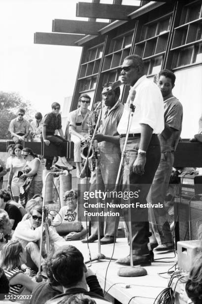 Blues singer and musician Howlin' Wolf performs with his blues ensemble at the Newport Folk Festival in July, 1966 in Newport, Rhode Island.