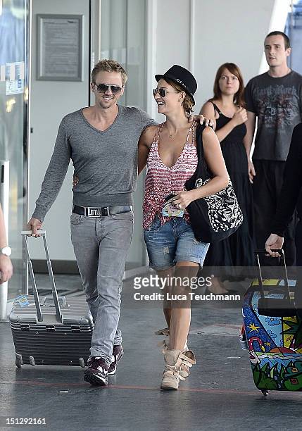 Sarah Connor and Florian Fischer leave Vienna at Airport Vienna on September 5, 2012 in Vienna, Austria.