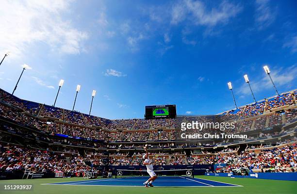 Andy Roddick of the United States serves against Juan Martin Del Potro of Argentina during their men's singles fourth round match on Day Ten of the...