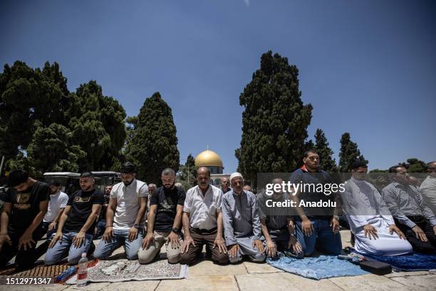 Muslims perform Friday prayer at Al-Aqsa Mosque Compound in Jerusalem on July 7, 2023.