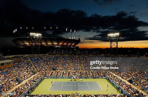 General view of the sun setting as Andy Murray of Great Britain competes against Marin Cilic of Croatia during their men's singles quarterfinal match...