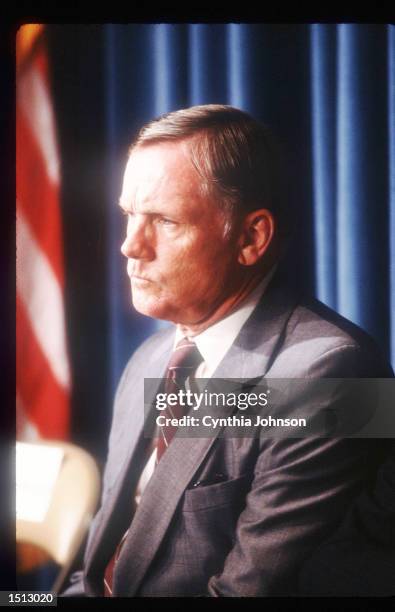 Former NASA astronaut Neil Armstrong listens to the findings of the Presidential Commission June 9, 1986 in Washington, D.C. Armstrong is Vice...