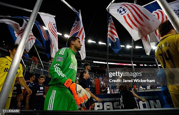 Andy Gruenebaum of the Columbus Crew walks onto the field prior to the game against the New England Revolution on September 5, 2012 at Gillette...