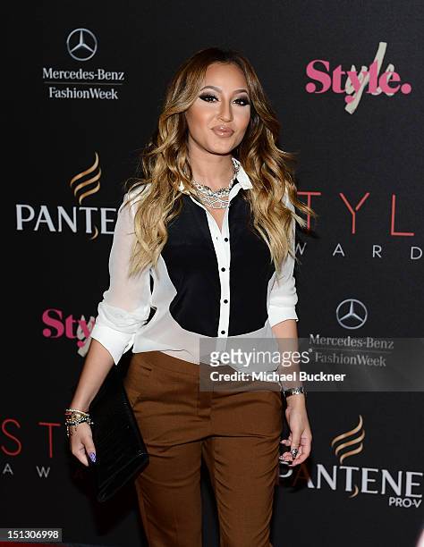 Singer Adrienne Bailon arrives at the 9th Annual Style Awards during Mercedes-Benz Fashion Week Spring 2013 at the Stage in Lincoln Center on...