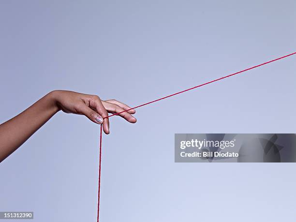 girl holding on to string - string bildbanksfoton och bilder