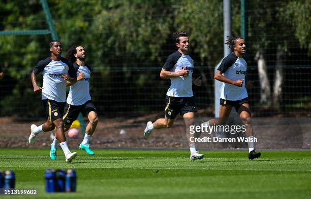 Andrey Santos, Marc Cucurella, Ben Chillwell and Malo Gusto of Chelsea during a training session at Chelsea Training Ground on July 7, 2023 in...
