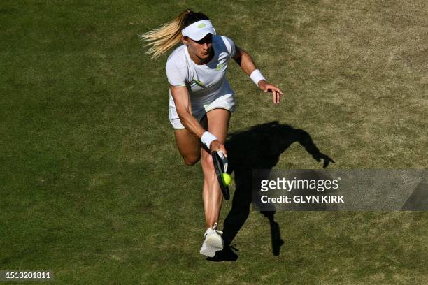 Ukraine's Lesia Tsurenko returns the ball to Romania's Ana Bogdan during their women's singles tennis match on the fifth day of the 2023 Wimbledon...