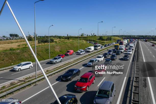 Thousands of cars , vans and trucks stuck in the giant traffic jam on the S6 highway, the TriCity ringroad are seen in Gdansk, Poland on 7 July 2023...