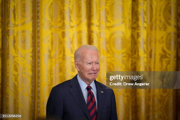 President Joe Biden arrives onstage for an event about lowering health care costs in the East Room of the White House on July 7, 2023 in Washington,...