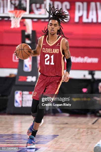 Emoni Bates of the Cleveland Cavaliers dribbles the ball during the game against the Brooklyn Nets during the 2023 NBA Las Vegas Summer League on...
