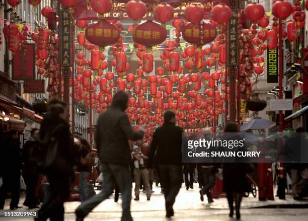 The streets of Chinatown in west London are decorated for Chinese Lunar New Year on February 5, 2008. Britain's Chinese community is busily preparing...