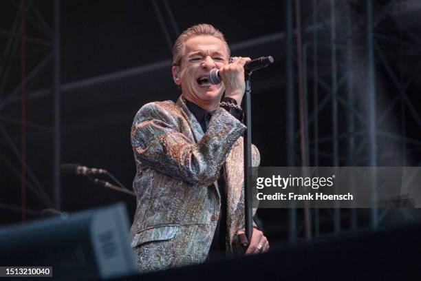 Singer Dave Gahan of the British band Depeche Mode performs live on stage during a concert at the Olympiastadion on July 07, 2023 in Berlin, Germany.