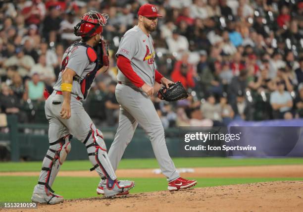 St. Louis Cardinals catcher Ivan Herrera chats with St. Louis Cardinals starting pitcher Jordan Montgomery during a Major League Baseball game...