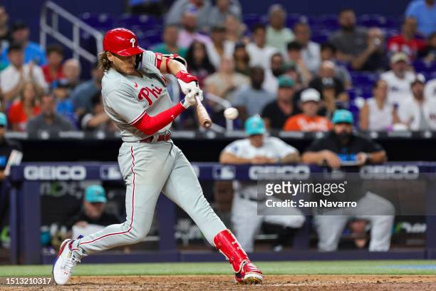 Alec Bohm of the Philadelphia Phillies hits an RBI double against the Miami Marlins during the ninth inning at loanDepot park on July 7, 2023 in...