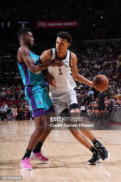 Victor Wembanyama of the San Antonio Spurs dribbles the ball during the 2023 NBA Las Vegas Summer League against the Charlotte Hornets on July 7,...