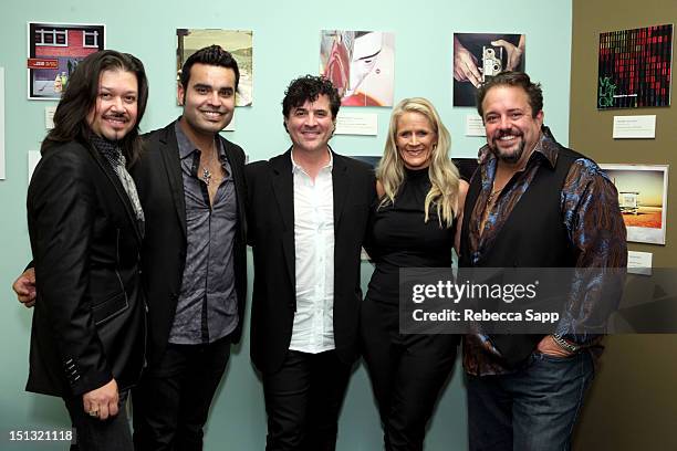 Eddie Perez and Michael Guara of The Mavericks with President and CEO of Big Machine Label Group Scott Borchetta, Vice President of A&R Big Machine...