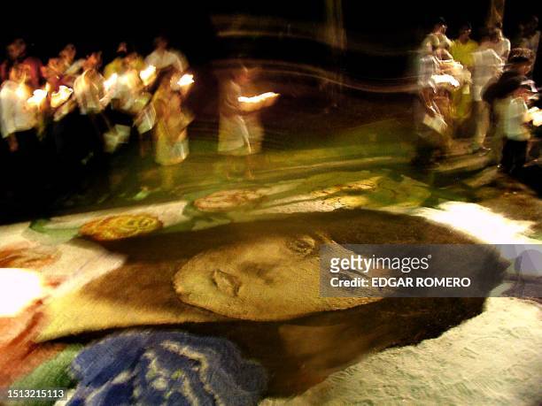 People march in remembrance of the assasination of six Jesuit priests and two of their house workers 15 November 2001 San Salvador, El Salvador. La...