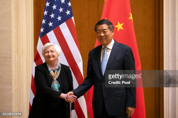 Treasury Secretary Janet Yellen shakes hands with Chinese Vice Premier He Lifeng during a meeting at the Diaoyutai State Guesthouse on July 8, 2023...
