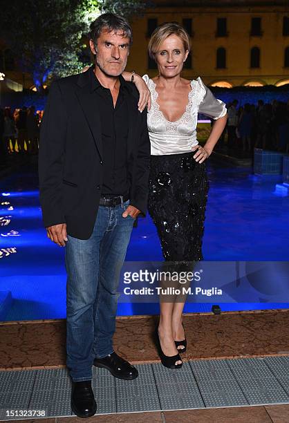 Renato De Maria and Isabella Ferrari attends the "Ciak"magazine party at Lancia Cafe during the 69th Venice Film Festival on September 5, 2012 in...