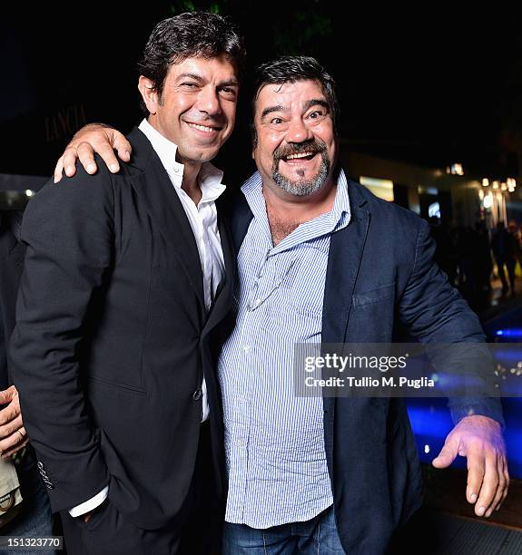 Actors Francesco Pannofino and Pierfrancesco Favino attend the "Ciak"magazine party at Lancia Cafe during the 69th Venice Film Festival on September...