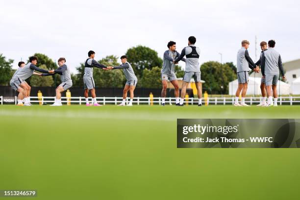 General view as Wolves warm up during a Wolverhampton Wanderers training session as they return to Compton for pre-season at The Sir Jack Hayward...