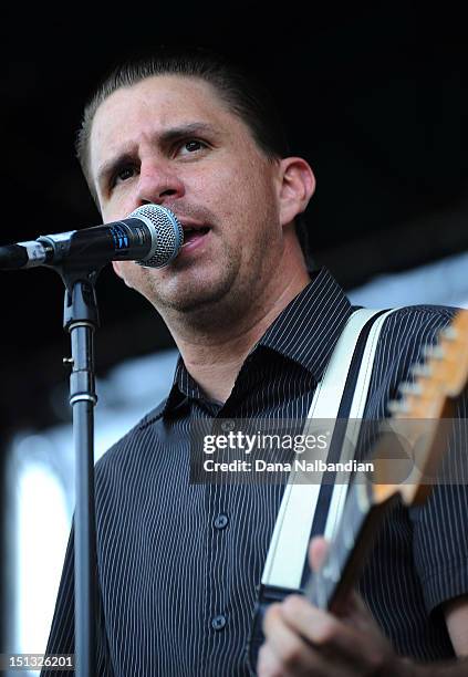 Singer/guitarist Jesse Wagner of Aggrolites performs at Marymoor Amphitheater on September 5, 2012 in Redmond, Washington.