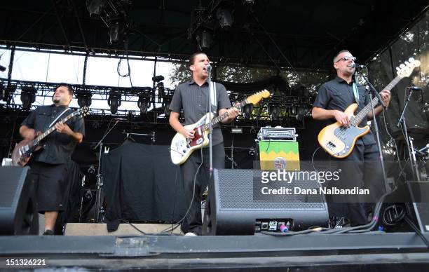 Musicians Ricky Chacon, Jesse Wagner and Jeff Roffredo of Aggrolites peforms at Marymoor Amphitheater on September 5, 2012 in Redmond, Washington.