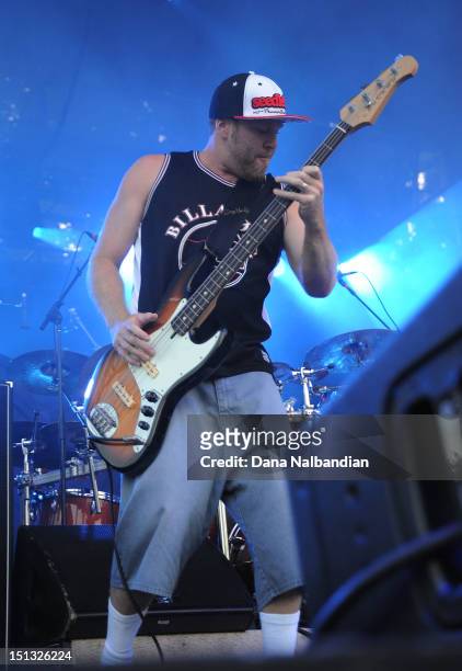Bass player Miles Doughty of Slightly Stoopid peforms at Marymoor Amphitheater on September 5, 2012 in Redmond, Washington.