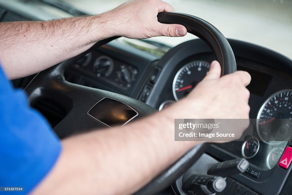 Man driving truck, close up