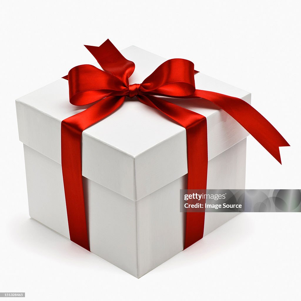 Gift box with red ribbon