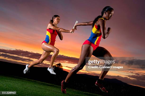Female Relay 119 Black Female Relay Runner Stock Photos, High-Res Pictures, and ...