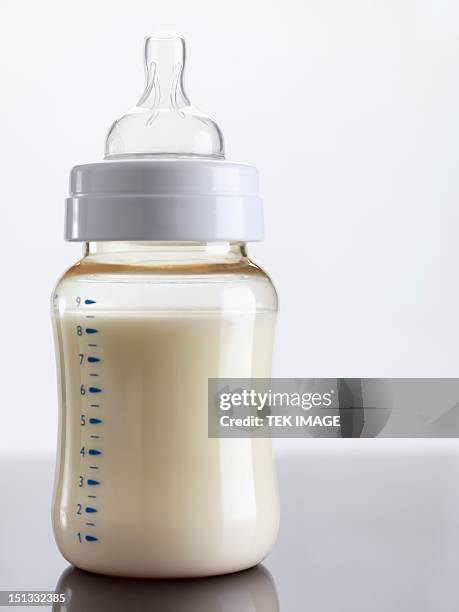 baby's bottle - milk powder stock pictures, royalty-free photos & images